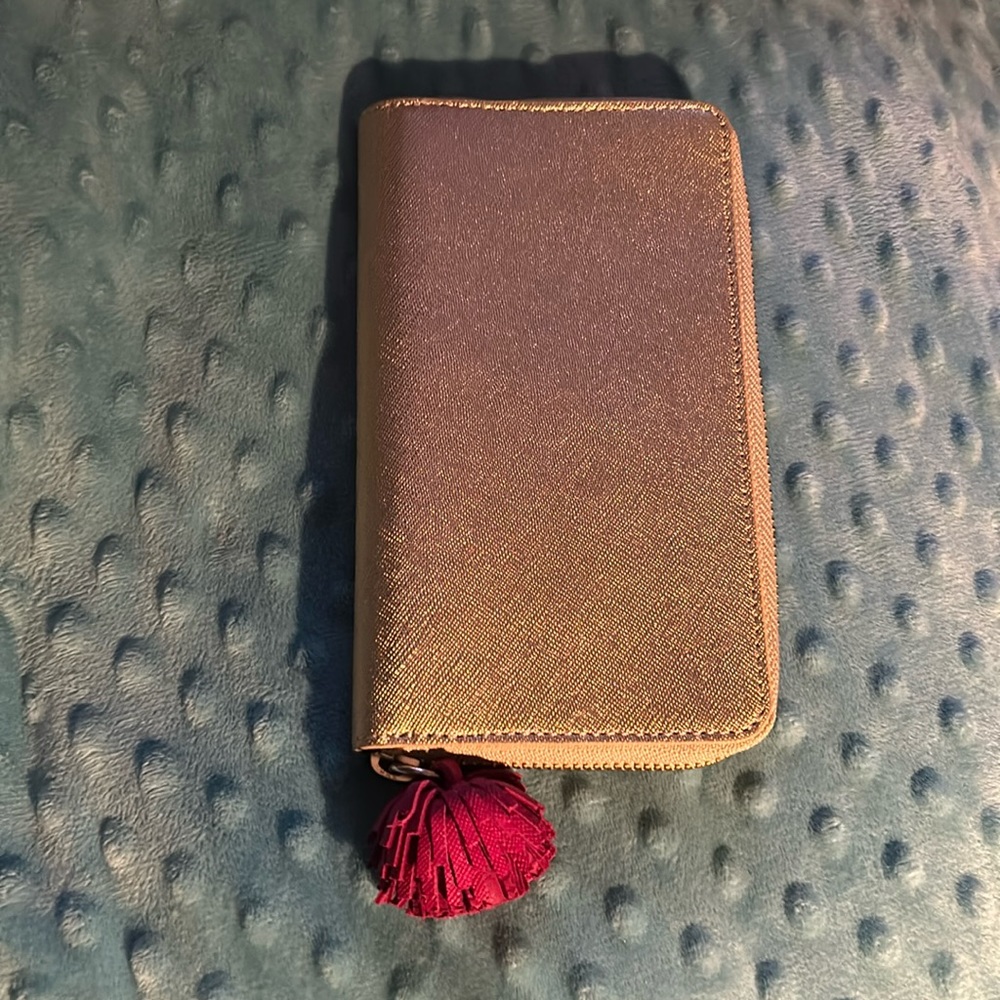Talbots gold leather phone wallet. Fits my 14 IPhone.